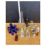 Assorted Glass Bottles and Lamp Chimney