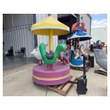 Coin-Operated Children's Carousel Ride with Animal Figures