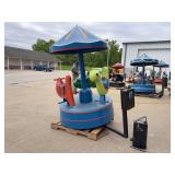 Coin-Operated Children's Carousel Ride with Animal Figures