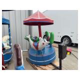 Coin-Operated Children's Carousel Ride with Animal Figures