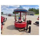Coin-Operated Carousel Ride with Multiple Figures