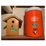 Wooden Birdhouse and Rubbermaid Water Dispenser