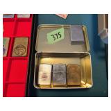 Zippo Lighter Assortment with Champion Spark Plugs and Hawaii Examples
