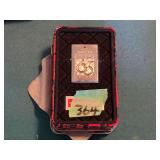 Zippo 65th Anniversary Lighter and Tin, 1932-1997