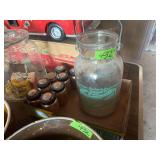 Kitchenware Assortment Including Glass Butter Churn, Two Ceramic Bowls, and Spice Shakers