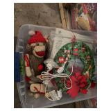 Assorted Holiday Decor and Plush Toy Collection in Storage Bin