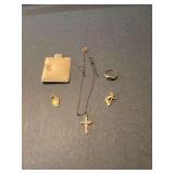 Collection of Gold Jewelry Including Cross Necklace, Pendants, and Ring