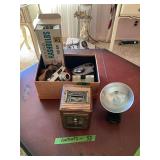 Mixed Lot of Collectibles Including US Post Office Box Bank, Cameras, and Art Prints