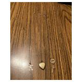 Collection of Three Gold-Tone and Silver-Tone Pendants and Necklaces