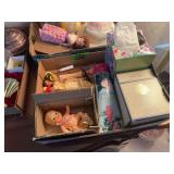Assorted Lot of Dolls, Bath and Body Works Cream, and Estee Lauder Powder