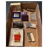 Collection of Assorted Lighters, Money Clips, and Accessories