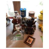 Collection of Assorted Kitchen Tins, Glassware, and Decorative Figures