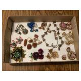 Assorted Costume Jewelry Collection Including Brooches, Necklaces, and Earrings