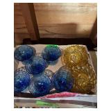 Assorted Glassware Collection Including Blue Textured Footed Bowls and Amber Swirl Dishes