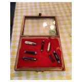 Assortment of Folding Pocket Knives in Display Case