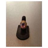 Oval Purple Stone Ring with Decorative Metal Setting
