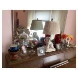 Assorted Home Decor Collection Including Glassware, Figurine, and Floral Arrangement