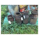 Collection of Four Metal Milk Cans