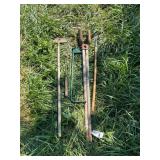 Assorted Long-Handled Garden Tools and Hand Saw