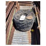 Coil of Barbed Wire Fencing