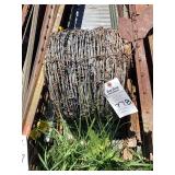 Coil of Barbed Wire Fencing