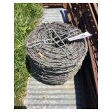 Coil of Barbed Wire Fencing