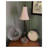 Assorted Home Decor Lot Featuring Glass Platter, Covered Jar, Decorative Plate, and Table Lamp