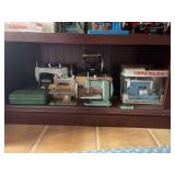 Collection of Miniature and Toy Sewing Machines including Singer, Hamilton Ross, and Betsy Ross
