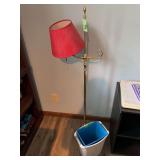 Brass Tone Floor Lamp with Red Shade and Nested Plastic Tubs