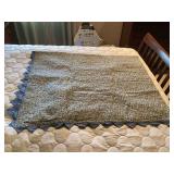 Quilted Fabric Bedding Piece with Floral Pattern and Scalloped Edge