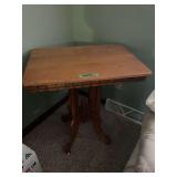 Oak Parlor Table with Pedestal Base and Casters