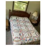 Handmade Double Wedding Ring Quilt with Multicolor Scrappy Fabric Pieces and full size bed