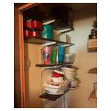 Closet Shelving Unit with Assorted Kitchenware, Party Supplies, and Storage Containers