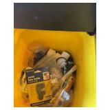 Assorted Plumbing Fittings, Tubing Cutter, and Pressure Gauge in Yellow Storage Bin