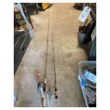 Two Fishing Rods with Spinning Reels and Cork Handles
