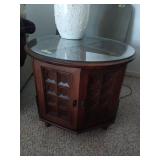 Round Wooden Accent Table with Glass Top and Storage Compartment