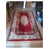 Red Floral Wool Area Rug with Fringe