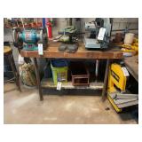 Heavy-Duty Wooden Workbench with Lower Shelf and Shop Contents
