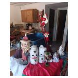 Assorted Christmas Holiday Decor Lot Including Santa Figures, Nutcracker, and Tree