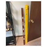 Two Long Levels Including Wooden and Yellow Metal Models