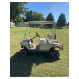 Club Car Golf Cart with Beige Body and Roof Canopy