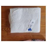 Handmade Quilted Textile Featuring Traditional Patchwork Design