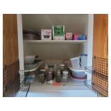 Pantry Storage Unit with Assorted Kitchenware, Dry Goods, and Herbs