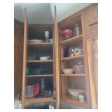 Assorted Kitchen Cabinet Contents Including Bakeware, Dinnerware, and Glassware
