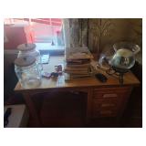 Oak Single Pedestal Writing Desk with Assorted Contents Including Books and Glass Jars