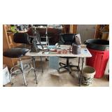 Assorted Workshop Lot with Cast Iron Hand Pump, Rolling Chair, Clamps, and Containers