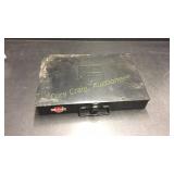 Metal case with insulated electrical connectors