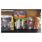 2 boxes of VHS tapes and DVD set
