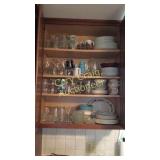 Cabinet full of glasses, plates and bowls