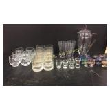 Assortment of glasses with glass pitcher